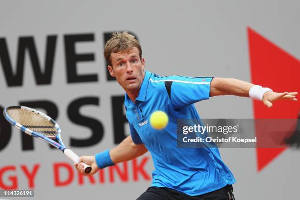 Daniel Gimeno-Traver of Spain plays a forehand in the blue group during the match between Philipp Kohlschreiber of Germany and Daniel Gimeno-Traver...