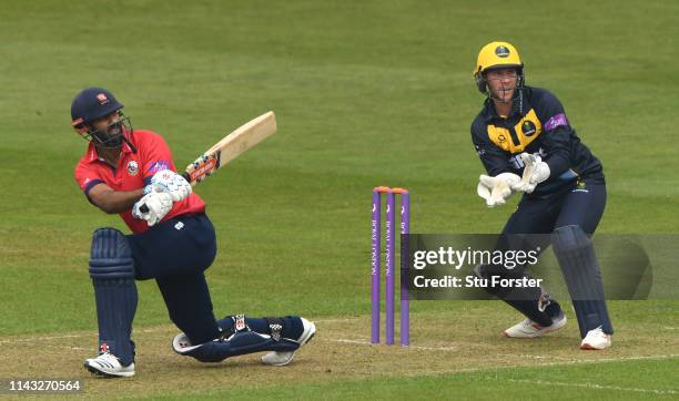 Essex batsman Varun Chopra hits a ball to the boundarywatched by Chris Cooke of Glamorgan during the Royal London One Day Cup match between Glamorgan...