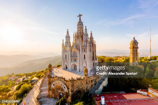 aerial view of barcelona skyline with sagrat cor temple, catalonia, spain - barcelona day photos et images de collection