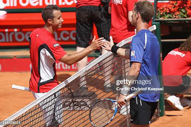 Philipp Kohlschreiber of Germany ongratulates Daniel Gimeno-Traver of Spain after their match in the blue group during day four of the Power Horse...