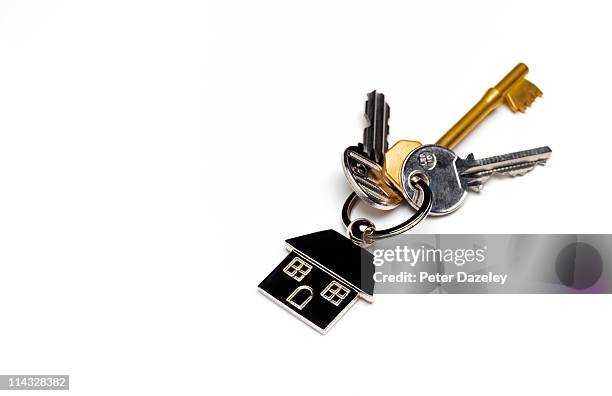 house keys with copy space - llave de la casa fotografías e imágenes de stock