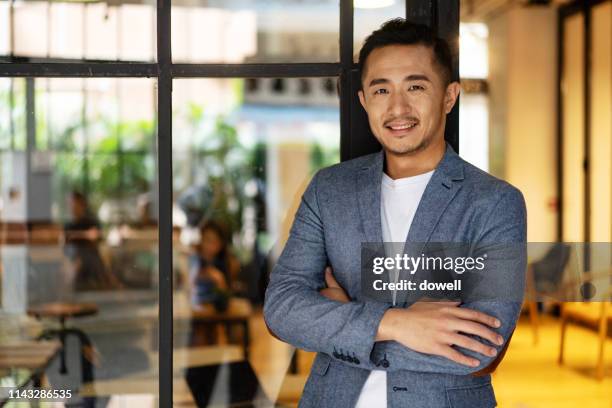 portait of businessman - chinese businessman stock pictures, royalty-free photos & images