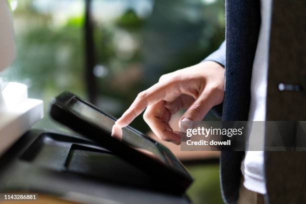 finger tounch screan of printer - fax machine stock pictures, royalty-free photos & images