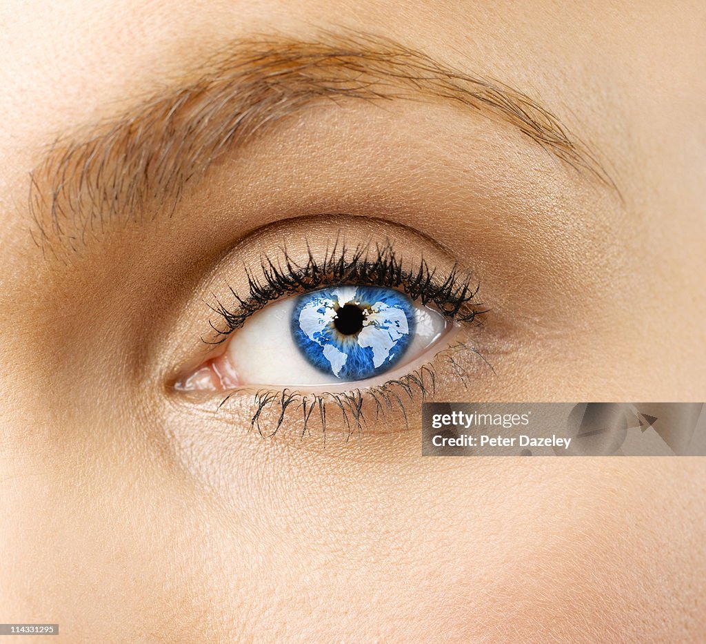 Close up of girls eye with  globe