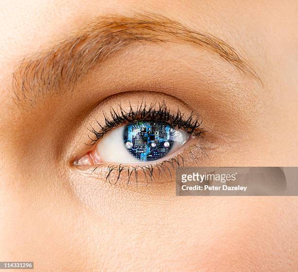 woman with cyborg eye - cyborg stock pictures, royalty-free photos & images