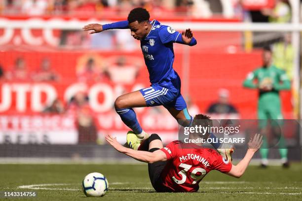 Cardiff City's English midfielder Josh Murphy vies with Manchester United's English midfielder Scott McTominay during the English Premier League...