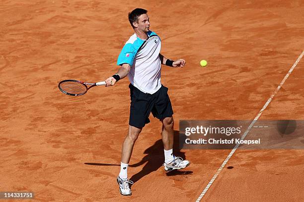 Robin Soederling of Sweden plays a forehand during the match between Maximo Gonzalez of Argentina and Robin Soederling of Sweden in the red group...