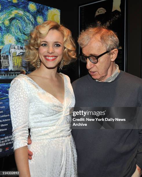 Director Woody Allen takes a good long look at Rachel McAdams at a screening of his new film "Midnight In Paris" at the Tribeca Grand Hotel. McAdams,...
