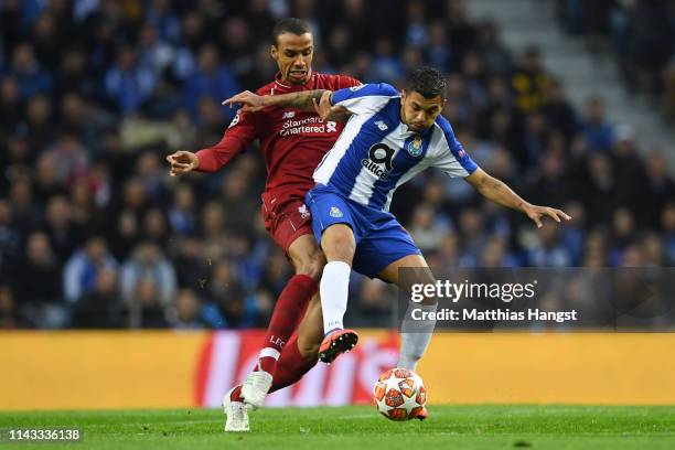 Joel Matip of Liverpool battles for possession with Jesus Manuel Corona of FC Porto during the UEFA Champions League Quarter Final second leg match...