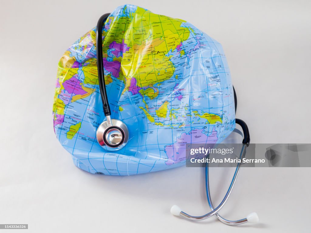 The planet earth and a stethoscope