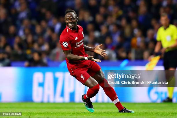 Sadio Mane of Liverpool celebrates scoring the opening goal during the UEFA Champions League Quarter Final second leg match between Porto and...