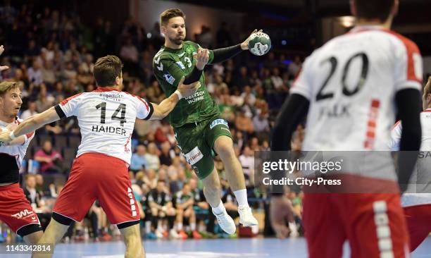 Maximilian Haider of the Eulen Ludwigshafen and Fabian Wiede of the Fuechse Berlin during the match between the Fuechse Berlin and the Eulen...