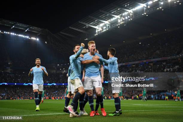 Kevin De Bruyne and Bernardo Silva of Manchester City celebrate with teammates after their team's fourth goal during the UEFA Champions League...