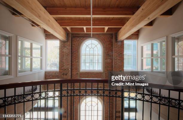 balcony in office building - brick arch stock pictures, royalty-free photos & images