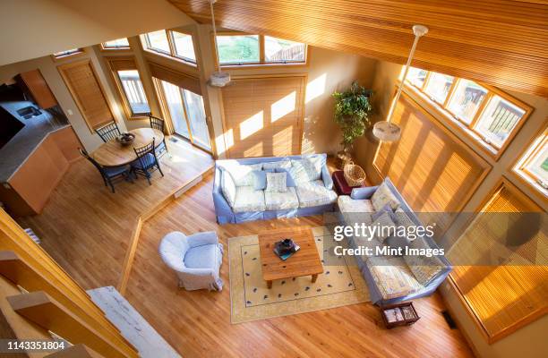 view of living room and dining room from loft - table fan stock pictures, royalty-free photos & images