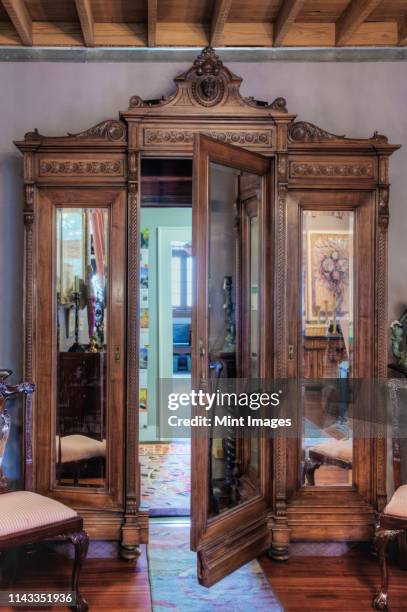 ornate wardrobe with secret door - ornate house furniture stock pictures, royalty-free photos & images