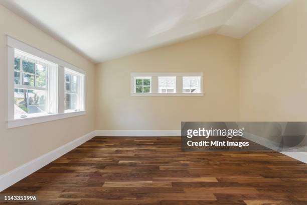 wooden floor in empty bedroom - domestic room stock pictures, royalty-free photos & images
