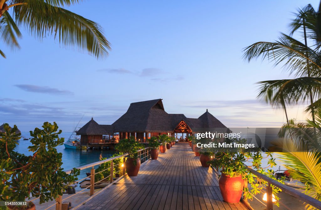 Deck and restaurant over tropical ocean, Bora Bora, French Polynesia