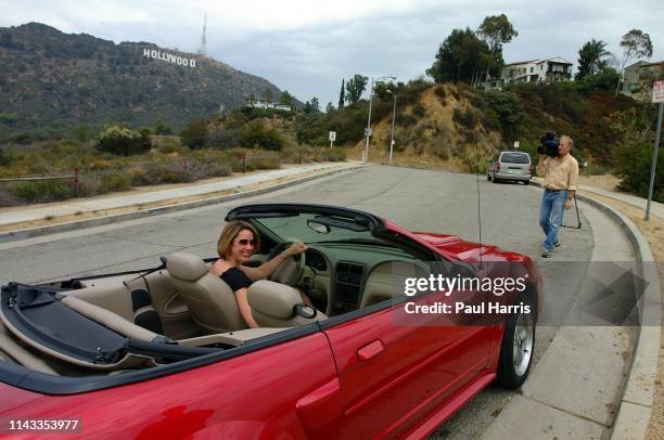 Television presenter, actress and now pop star Claire Sweeney poses in the shadow of the Hollywood sign after the recording of her first album...