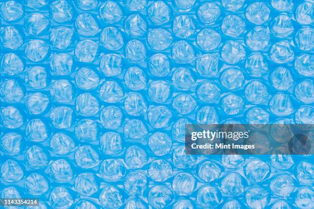 close up of bubble wrap - bubble wrap stock pictures, royalty-free photos & images