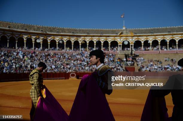 French bullfighter Sebastian Castella performs with a capote during a bullfight at the Real Maestranza bullring in Sevilla on May 12, 2019.