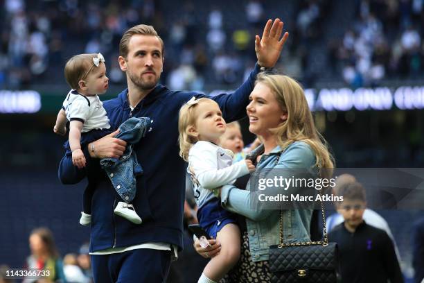 Harry Kane of Tottenham Hotspur walls the pitch with his family after the Premier League match between Tottenham Hotspur and Everton FC at Tottenham...