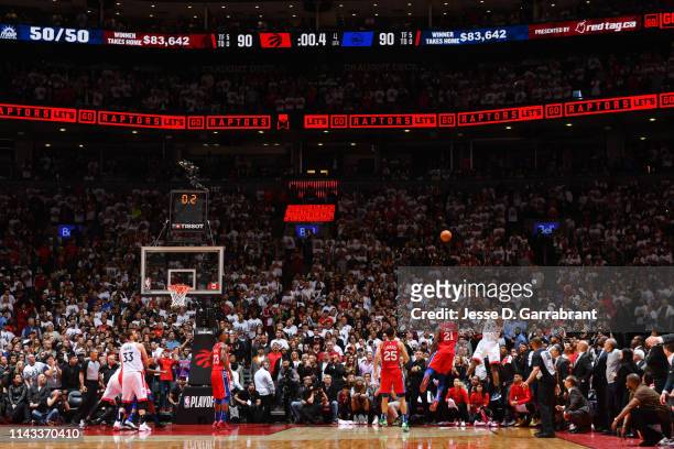 Kawhi Leonard of the Toronto Raptors shoots the ball to win the game against the Philadelphia 76ers during Game Seven of the Eastern Conference...
