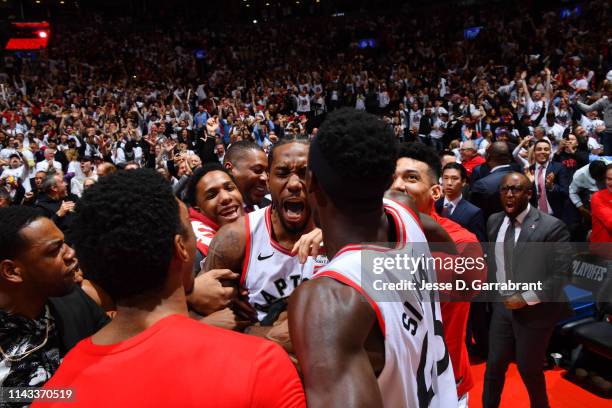 Kawhi Leonard of the Toronto Raptors reacts after defeating the Philadelphia 76ers in Game Seven of the Eastern Conference Semi-Finals of the 2019...