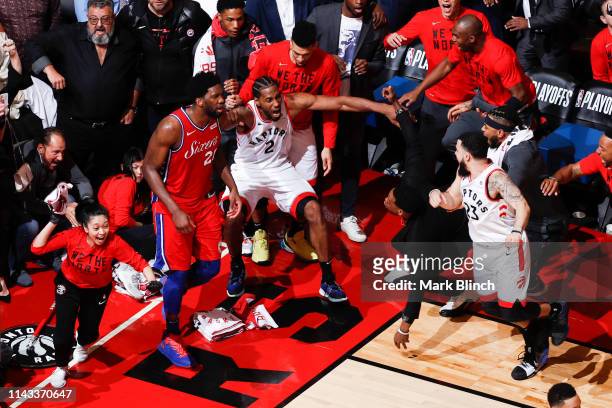 Kawhi Leonard of the Toronto Raptors reacts to hitting the game winning shot against the Philadelphia 76ers during Game Seven of the Eastern...