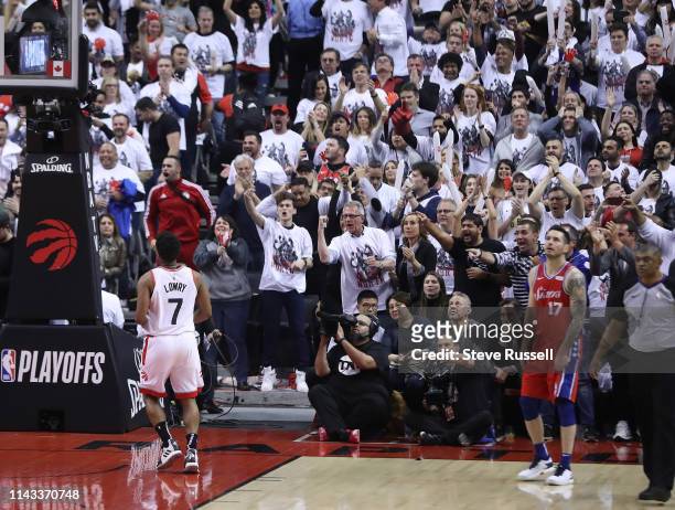 The fans cheer Toronto Raptors guard Kyle Lowry runs up the floor after a basket as as the Toronto Raptors play the Philadelphia 76ers in game seven...