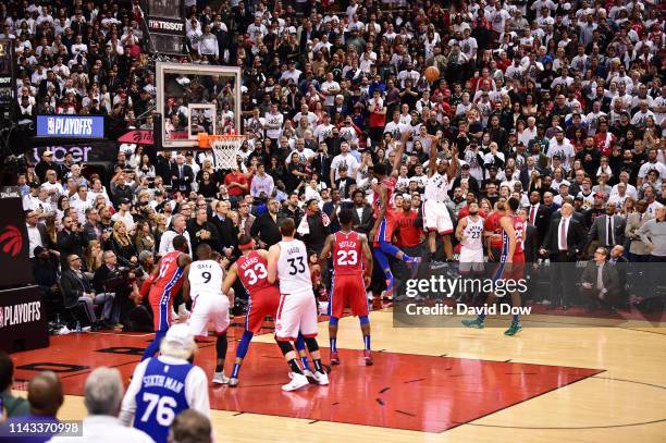 Kawhi Leonard of the Toronto Raptors shoots the game winning basket against the Philadelphia 76ers during Game Seven of the Eastern Conference...