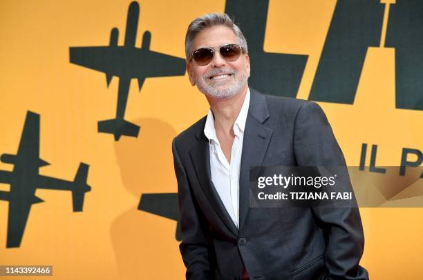 Actor and film director George Clooney poses during a photocall of the Catch-22 TV show on May 13, 2019 in Rome.