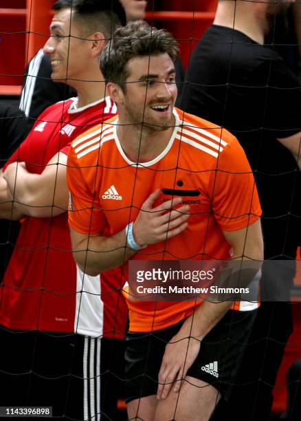 Andrew Taggart of the Chainsmokers watches as his team competes during the Copa Del Rave Charity Soccer Tournament at Evolve Project LA on April 17,...