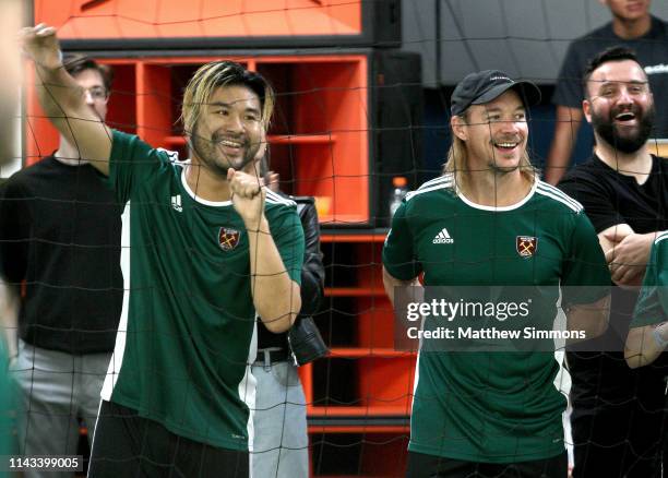 S Wax Motif and Diplo watch as their team competes during the Copa Del Rave Charity Soccer Tournament at Evolve Project LA on April 17, 2019 in Los...