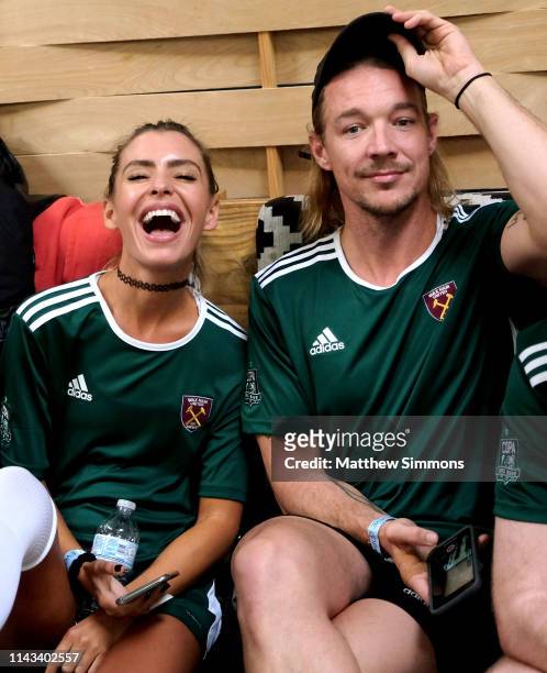 Sam Blacky and Diplo hang out between matches during the Copa Del Rave Charity Soccer Tournament at Evolve Project LA on April 17, 2019 in Los...