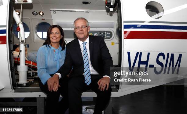 Scott Morrison, Prime Minister of Australia, and his wife Jenny Morriosn, pose at the Royal Flying Doctors Base at Launceston Airport on April 18,...