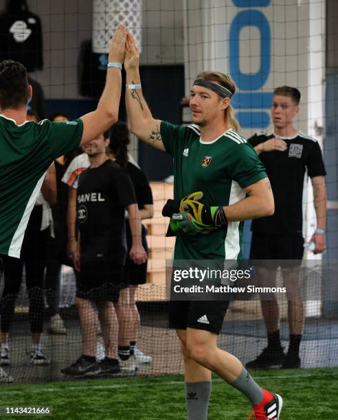 Diplo celebrates during the Copa Del Rave Charity Soccer Tournament at Evolve Project LA on April 17, 2019 in Los Angeles, California.