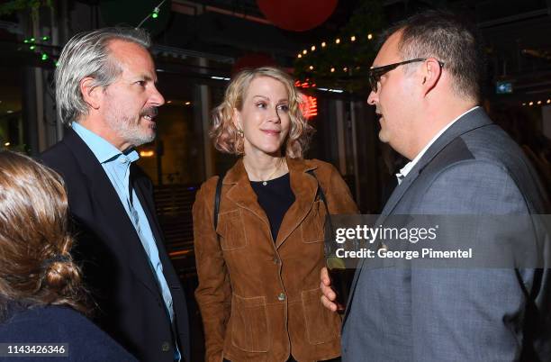 Co Writer Graham Yost, Writer Moira Walley-Beckett and Russ Sheppard attend "The Grizzlies" premiere after party held at Assembly Food Hall on April...