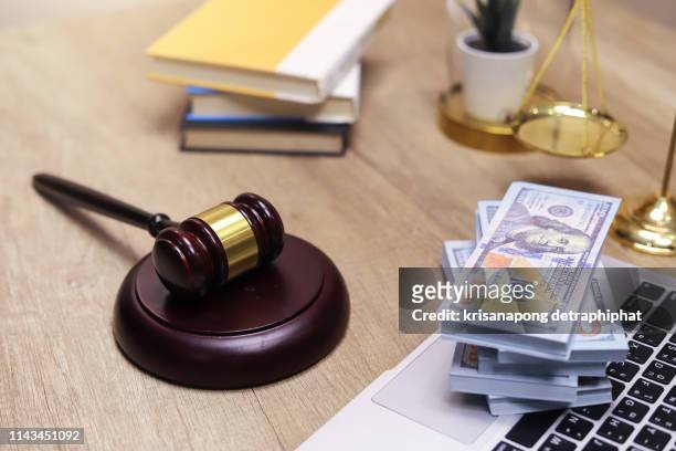 financial law concept , law and money, financial institution law,corruption - lawsuit fotografías e imágenes de stock