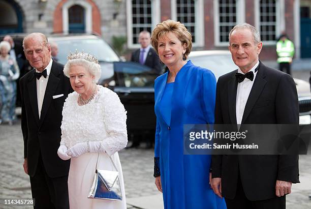 Irish President Mary McAleese and husband Martin McAleese greet Queen Elizabeth II and Prince Philip, Duke of Edinburgh as they arrive for a State...