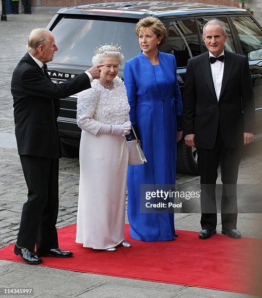 Prince Philip, Duke of Edinburgh and Queen Elizabeth II arrive with Irish President Mary McAleese and her husband Dr. Martin McAleese for a State...