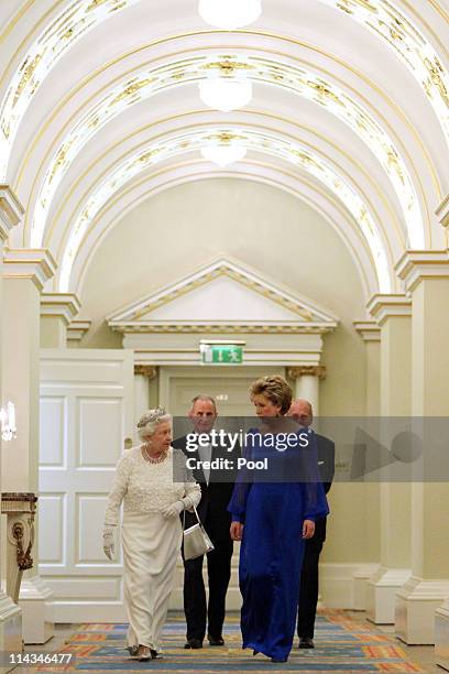 Queen Elizabeth II, Irish President Mary McAleese, Dr. Martin McAleese and Prince Philip, Duke of Edinburgh attend a State Dinner at Dublin Castle,...