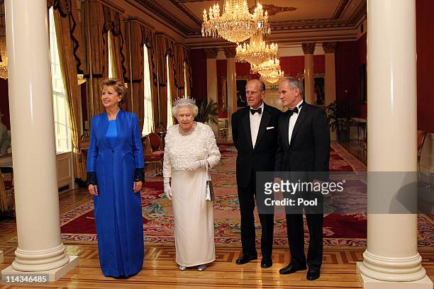 Irish President Mary McAleese, Queen Elizabeth II, Prince Philip, Duke of Edinburgh and Dr. Martin McAleese attend a State Dinner at Dublin Castle,...
