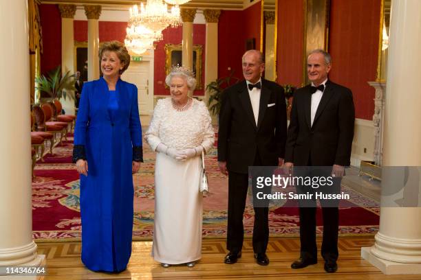 Irish President Mary McAleese, Queen Elizabeth II, Prince Philip, Duke of Edinburgh and Martin McAleese attend a State Dinner on May 18, 2011 in...