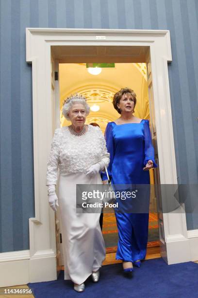 Queen Elizabeth II and Irish President Mary McAleese arrive for a State Dinner at Dublin Castle, on May 18, 2011 in Dublin, Ireland. The Duke and...