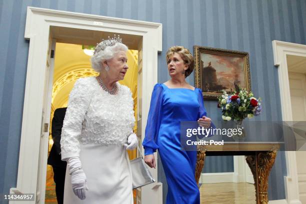 Queen Elizabeth II and Irish President Mary McAleese arrive for a State Dinner at Dublin Castle, on May 18, 2011 in Dublin, Ireland. The Duke and...