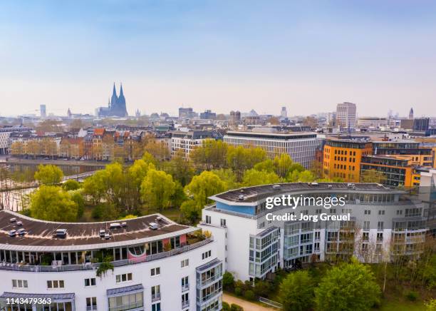 cologne city center with cologne cathedral in the distance - cologne skyline stock pictures, royalty-free photos & images