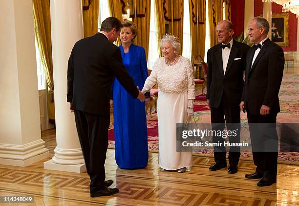 Irish President Mary McAleese, Queen Elizabeth II, Prince Philip, Duke of Edinburgh and Martin McAleese greet Prime Minister David Cameron attend a...