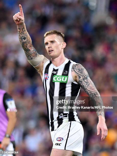 Dayne Beams of the Magpies celebrates kicking a goal during the round 5 AFL match between Brisbane and Collingwood at The Gabba on April 18, 2019 in...