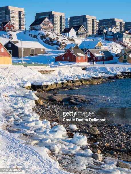 view over old town and colonial harbour towards modern quarters of nuuk, greenland, denmark - nuuk greenland stock pictures, royalty-free photos & images